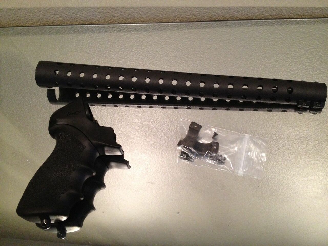 1__38775.1558182433.jpg Hogue Fits Mossberg 500 Pistol Grip Heat Shield Rubber Overmold USA Made - Image 1